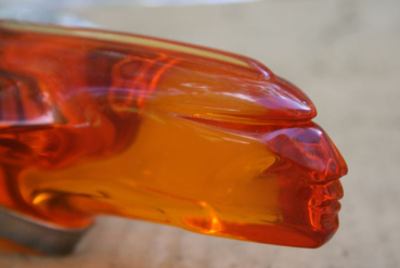 Hood Ornament "Indianhead" for 1955 Pontiac - amber